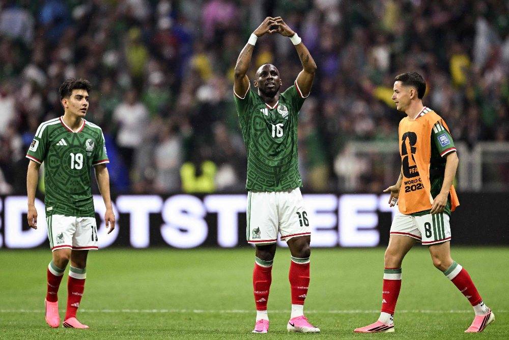 Mexico's forward #16 Julian Quinones celebrates next to teammates midfielder #19 Gilberto Mora and midfielder #08 Alvaro Fidalgo scoring his team's first goal during the 2026 World Cup round of 32 football match between Mexico and Ecuador at the Mexico City Stadium in Mexico City. Photo by AFP