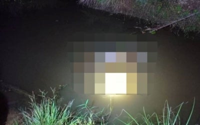 An autistic six-year-old boy reported missing yesterday evening was found dead in an oil palm plantation in Kampung Baru, near Sungai Sumun, Hutan Melintang, last night. Photo: Fire and Rescue Department