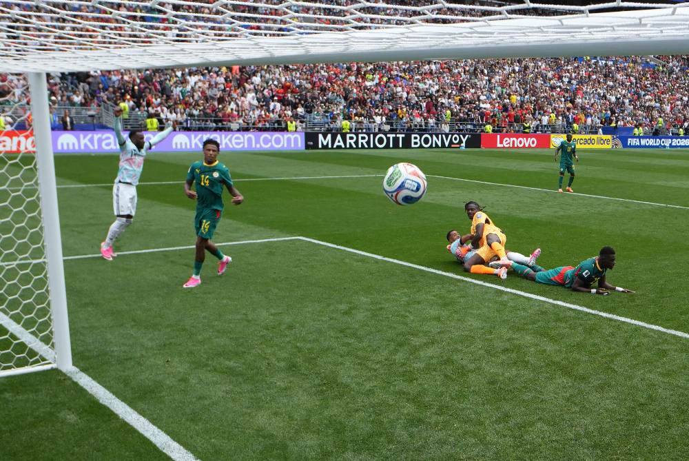 Youri Tielemans #8 of Belgium heads to score the team's second goal during the FIFA World Cup 2026 Round Of 32 match between Belgium and Senegal at Seattle Stadium Photo by Alex Grimm/Getty Images via AFP