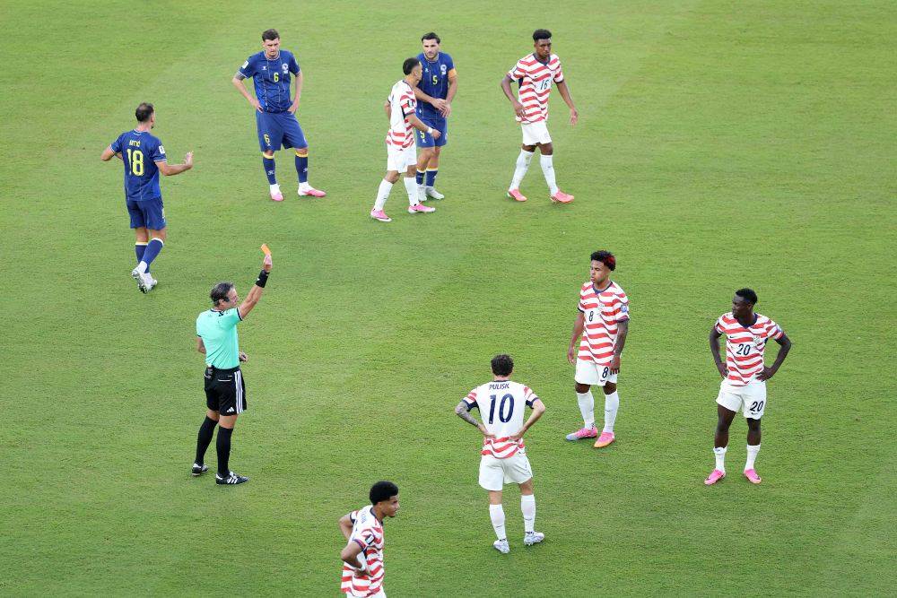 Referee Raphael Claus shows Folarin Balogun #20 of the United States a red card for a foul on Tarik Muharemovic #4 of Bosnia and Herzegovina during the FIFA World Cup 2026 Round of 32 match between USA and Bosnia and Herzegovina at San Francisco Bay Area Stadium. Photo by AFP