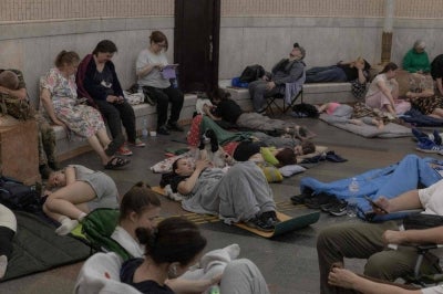 People take shelter at a metro station during Russian air attacks on Kyiv, early on July 2, 2026, amid the Russian invasion of Ukraine. Photo by AFP