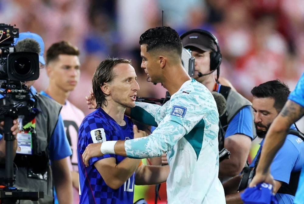 Luka Modric #10 of Croatia congratulates Cristiano Ronaldo #7 of Portugal after the 2-1 win during the FIFA World Cup 2026 Round of 32 match between Portugal and Croatia at Toronto Stadium on July 2, in Toronto, Ontario. - (Photo by Buda Mendes / Getty Images via AFP)