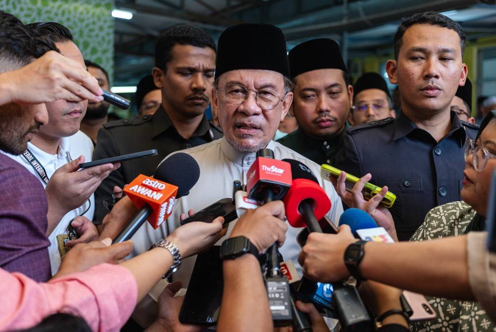 Prime Minister Datuk Seri Anwar Ibrahim after Friday prayers at Masjid As-Sodiqin, Taman Kobena, Kuala Lumpur, today. - Photo by Bernama