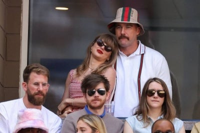 US singer-songwriter Taylor Swift (L) and US NFL football player Travis Kelce attend the men's final match between Italy's Jannik Sinner and USA's Taylor Fritz on day fourteen of the US Open tennis tournament at the USTA Billie Jean King National Tennis Center in New York City, on Sept 8, 2024. - (Photo by CHARLY TRIBALLEAU / AFP)