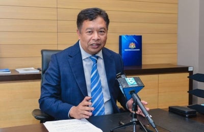Immigration director-general Datuk Zakaria Shaaban said those detained in the 5.10 am operation included those individuals who have been blacklisted from entering Malaysia. Photo by Bernama
