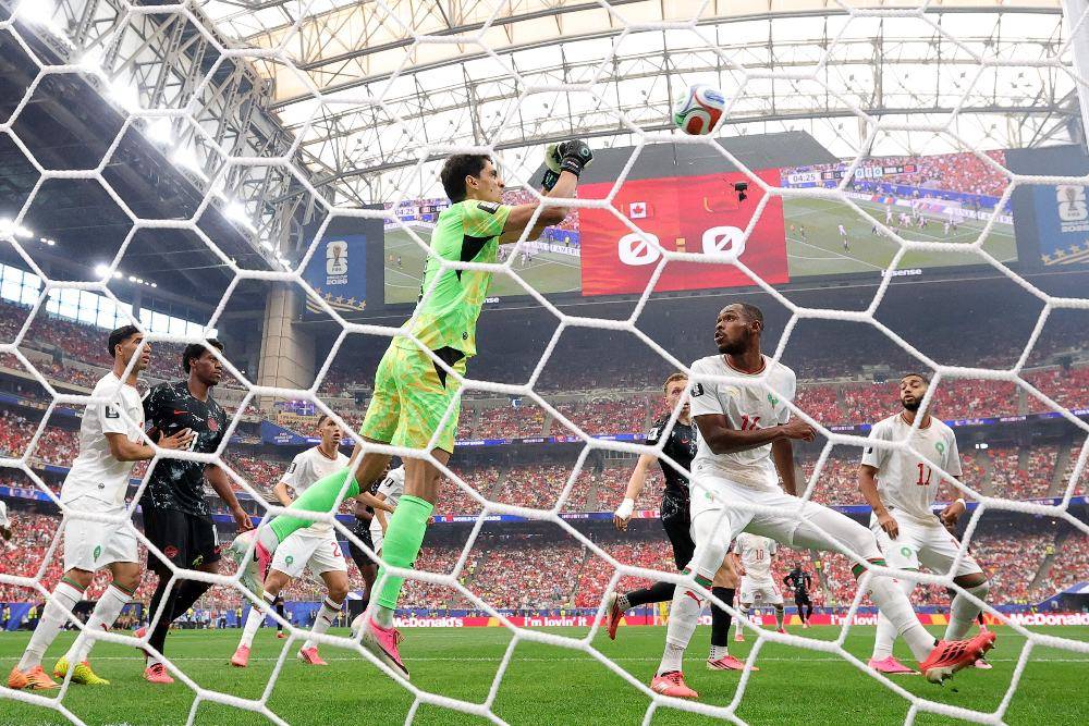 Yassine Bounou #1 of Morocco punches the ball during the FIFA World Cup 2026 Round of 16 match between Canada and Morocco at Houston Stadium. Photo by Getty Image via AFP