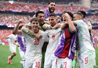 Azzedine Ounahi #8 of Morocco celebrates with teammates after scoring his team's second goal during the FIFA World Cup 2026 Round of 16 match between Canada and Morocco at Houston Stadium. Photo by AFP