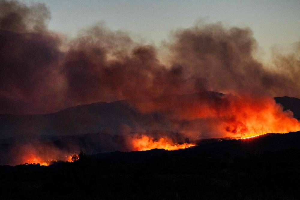 The prefecture of the Pyrénées-Orientales region said the evacuations took place in a mountain range west of the city of Perpignan. (Photo by Jc Milhet / AFP)