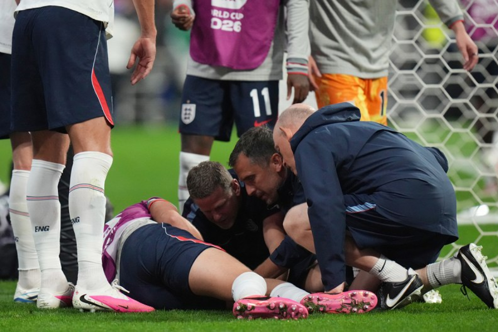Henderson was seen on video hopping over an advertising board at Azteca Stadium in Mexico City as England headed towards their fans at one end of the stadium to sing “Wonderwall” by Oasis, which has become tradition for the Three Lions. However, Henderson’s hand slipped and he was in clear pain after trying to break his fall. (Photo by AP)