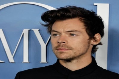Harry Styles arrives at the Los Angeles premiere of "My Policeman" at Regency Bruin Theatre on Nov 1, 2022 in Los Angeles, California. - (Photo by KEVIN WINTER / Getty Images via AFP)