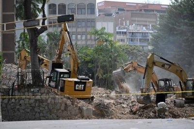 The magnitude 7.2 and 7.5 earthquakes struck Venezuela on June 24, followed by a series of weaker aftershocks. The coastal state of La Guaira has been among the hardest-hit areas. Thousands of people are still missing, with more than 16,700 injured in the disaster(Photo by Raul ARBOLEDA / AFP)