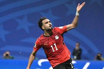 Egyptian winger Mostafa “Ziko” Mohamed Zaki Abdelraouf congratulates Argentina and expressed something on their supporters minds: "It was clear the tournament was already destined for a specific outcome.” (Photo by ROBERTO SCHMIDT / AFP)