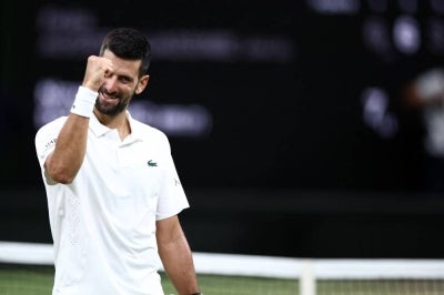 Novak Djokovic celebrates his win against Felix Auger-Aliassime (Photo by Henry Nicholls / AFP) / RESTRICTED TO EDITORIAL USE