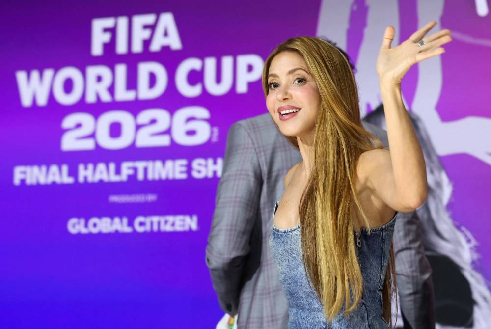 Colombian singer Shakira waves to the audience at the 2026 World Cup halftime show announcement during the Global Citizen and FIFA World Cup panel at the Global Citizen NOW event in New York City on May 14, 2026. - (Photo by CHARLY TRIBALLEAU / AFP)