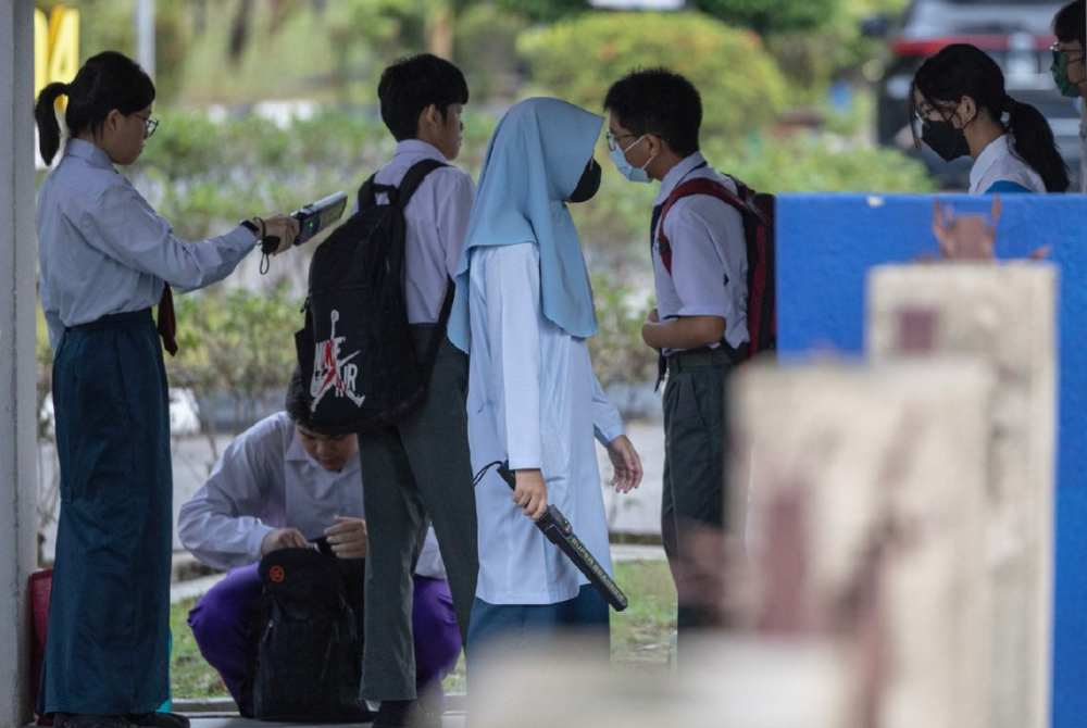Growing concerns over school safety have prompted calls for stronger security measures, with some suggesting the installation of metal detectors in schools. - Photo via astro awani edited in Canva