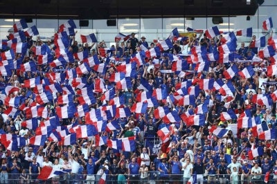 Tragedy strikes France's World Cup celebrations as a 17-year-old girl dies falling from a truck (Photo by CHARLY TRIBALLEAU / AFP)