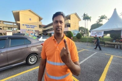 Sri Sangkar Gopalkrishnan, 43, who lives in Gelang Patah, arrived at the polling centre at SK Taman Universiti 2 in Skudai at 7.10am.