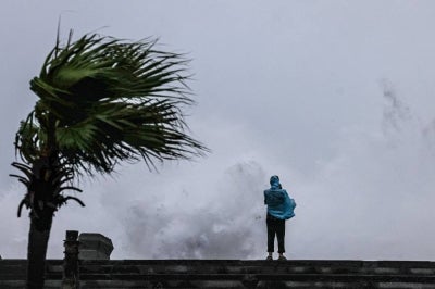  Typhoon Bavi passes off northeastern Taiwan, in Keelung on July 11, 2026. (Photo by I-Hwa Cheng / AFP)