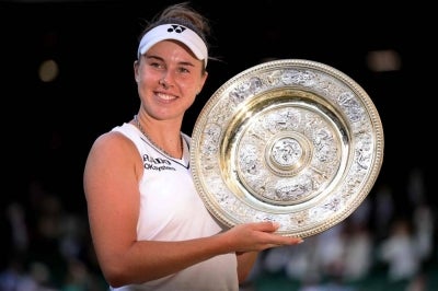 The 21-year-old is the youngest woman to win Wimbledon since her fellow Czech and childhood idol Petra Kvitova in 2011. (Photo by Henry NICHOLLS / AFP) / RESTRICTED TO EDITORIAL USE