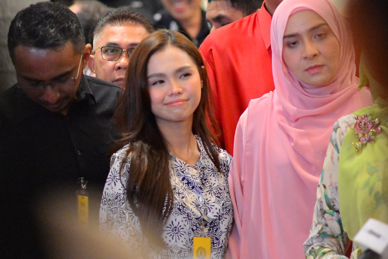 Bella (left) with Syed Saddiq's sister, Sharifah Amani. (PHOTO BY ASRIL ASWANDI SHUKOR)