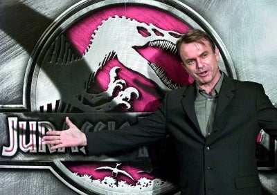 Actor Sam Neill poses during a press conference for the film Jurassic Park III (Photo by TORU YAMANAKA / AFP)