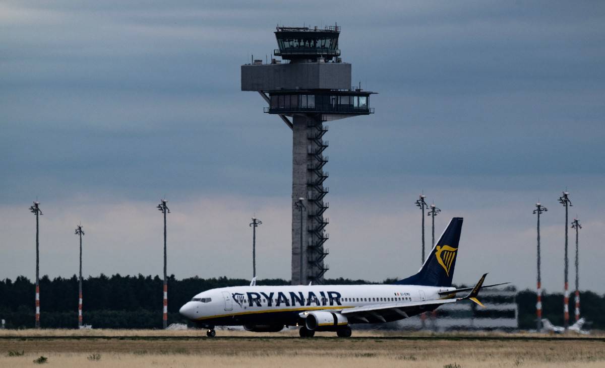One of RYANAIR's jets (Photo by John MACDOUGALL / AFP)
