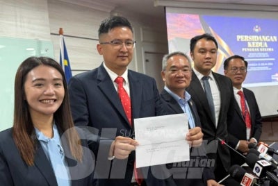 Melaka DAP chairman (centre) Khoo Poay Tiong said the decision is in line with the party's stance rejecting the bill, which it claimed contravenes democratic and electoral principles.