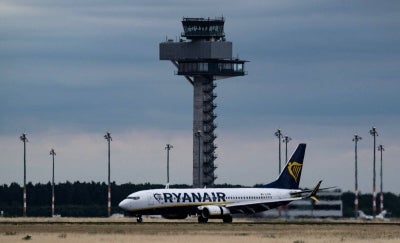One of RYANAIR's jets (Photo by John MACDOUGALL / AFP)