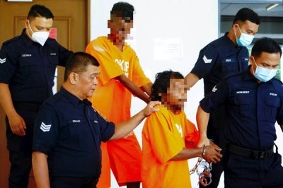 Two men - a foreign national and a local - were remanded for seven days, from today, to assist in the investigation into the murder of a 10-year-old girl whose body was found in Kampung Numbak, Sepanggar, yesterday. Photo by Bernama