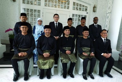 Johor Menteri Besar Datuk Onn Hafiz Ghazi (centre) poses for a photograph with the newly appointed line-up of Johor State Executive Council (Exco) members during a press conference announcing the council members at the Saujana official residence today. BERNAMA photo