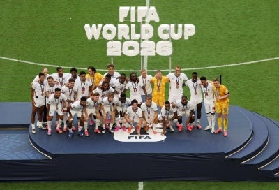 England players pose for a photograph after receiving their third place medals after their 6-4 win during the FIFA World Cup 2026 Bronze Final between France and England at Miami Stadium. Photo by AFP