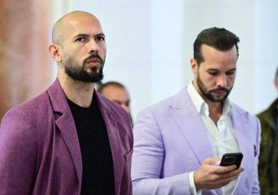 Andrew Tate (left) and his brother Tristan Tate are pictured inside The Court of Appeal in Bucharest, Romania, on December 10, 2024. AFP FILE PIX