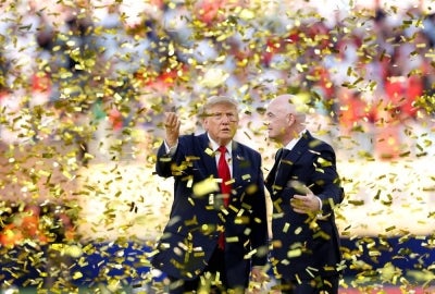 US President Donald Trump and FIFA chief Gianni Infantino were met with resounding boos as they walked onto the pitch Sunday for the presentation ceremony after Spain won the World Cup. Photo by AFP