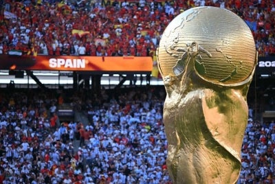 This view shows a huge replica of the World Cup trophy at the end of the 2026 World Cup football tournament final match between Spain and Argentina at the New York/New Jersey Stadium in East Rutherford on July 19, 2026. - (Photo by PAUL ELLIS / AFP)