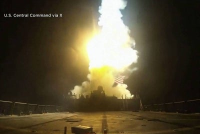 A screen grab from a handout video footage released by US CENTCOM on July 17, 2026 shows what the US military says is the latest wave of precision strikes on strategic Iranian military sites. Bombing intensified in the Middle East for the seventh consecutive night, with Iran threatening a "full-scale offensive" in response to American strikes and hitting several US military sites in Kuwait, Jordan and Bahrain. - (Photo by US Central Command (CENTCOM) / AFP)