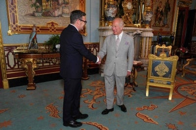 King Charles Britain's King Charles III shakes hands with Britain's incoming Prime Minister Andy Burnham, during an audience at Buckingham Palace, London, where he invited the leader of the Labour Party to become Prime Minister and form a new government. Photo by Aaron Chown/AFP