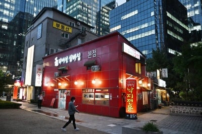 Under South Korean law, only 10 insect species are approved for human consumption, including grasshoppers and brown mealworm larvae. (Photo by GREG BAKER / AFP)