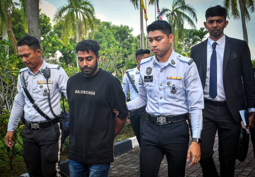 Bangladeshi plantation worker Md Habibullah, 28, was charged at the Shah Alam magistrate's court, today with reckless driving that resulted in the death of a food delivery rider in Puncak Alam on July 21, 2026. - Photo by Bernama