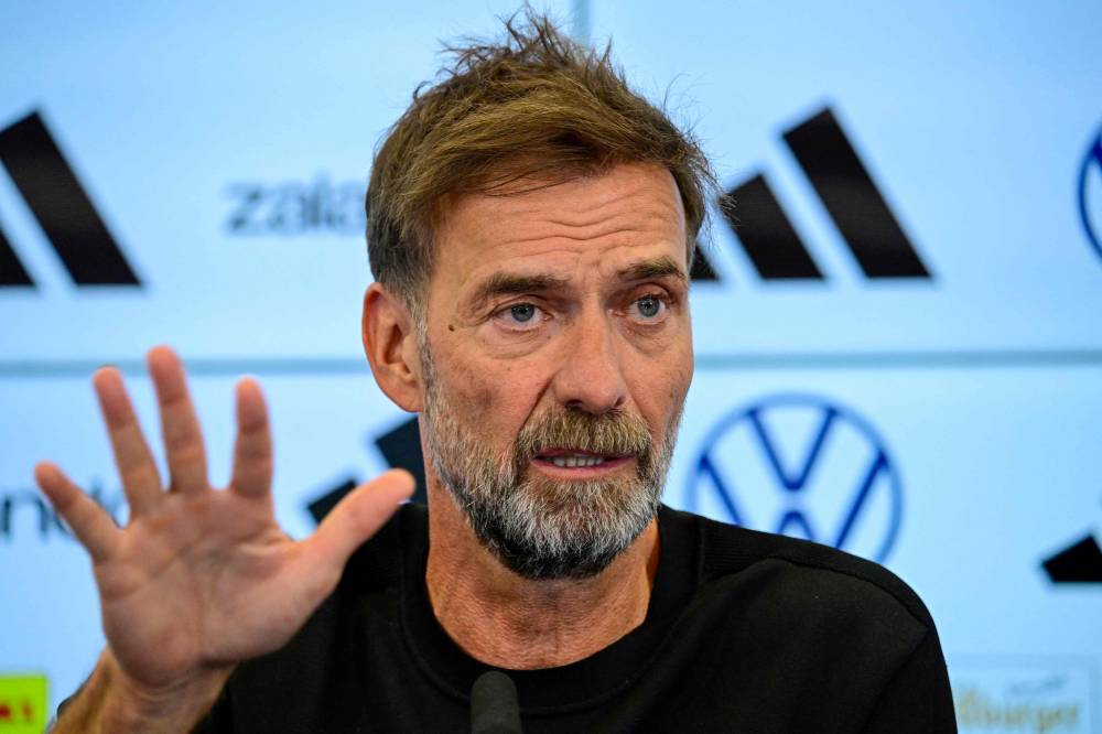 Newly appointed German coach Jurgen Klopp. (Photo by John MACDOUGALL / AFP)