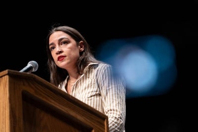 US Rep. Alexandria Ocasio-Cortez (D-NY) speaks at The People V. The Powerful rally at the Detroit Opera House on July 18, 2026 in Detroit, Michigan. Ocasio-Cortez, US Sen. Bernie Sanders (I-VT) and others joined El-Sayed to rally the crowds. (Photo by Sarah Rice / AFP)