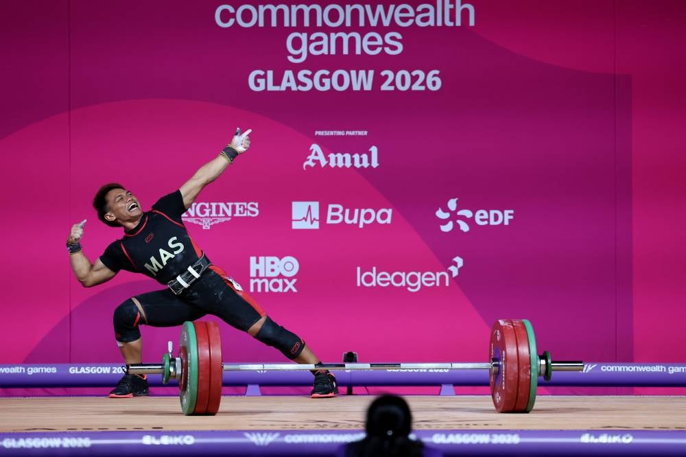 National weightlifter Mohamad Aniq Kasdan in action in the men's 60kg category at the Glasgow 2026 Commonwealth Games held at the Scottish Event Campus (SEC) Armadillo on July 26, 2026. (BERNAMA PHOTO)