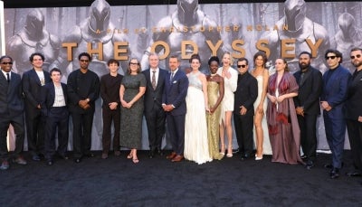 Travis Scott, Benny Safdie, Elliot Page, Corey Hawkins, Tom Holland, Emma Thomas, Christopher Nolan, Matt Damon, Anne Hathaway, Lupita Nyong'o, Charlize Theron, John Leguizamo, Zendaya, Samantha Morton, Himesh Patel, Jon Bernthal, and Logan Marshall-Green attend the premiere of "The Odyssey" presented by Universal Pictures on July 14, 2026 in New York City. (Photo by Mike Coppola / AFP)
