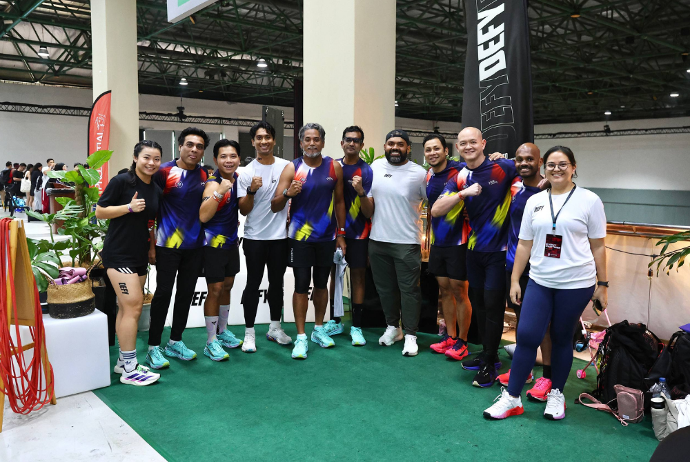Khairy Jamaluddin with Defy athletes - Photo Courtesy of Defy