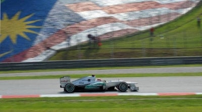 Mercedes driver Michael Schumacher of Germany powers his car during the qualifying round of Formula One's Malaysian Grand Prix at the Sepang International Circuit in Sepang on March 24, 2012. AFP FILE PIX