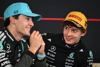 Mercedes' Italian driver Kimi Antonelli (R) and Mercedes' British driver George Russell (Photo by Jade GAO / AFP)