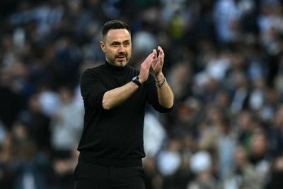 Tottenham Hotspur's Italian head coach Roberto De Zerbi (Photo by Ben STANSALL / AFP) 