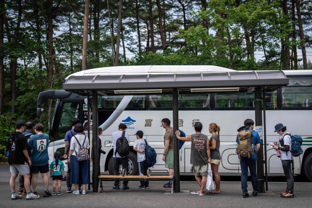 The number of foreign residents, meanwhile, rose 354,000 to a record 4,031,159.(Photo by Yuichi YAMAZAKI / AFP)