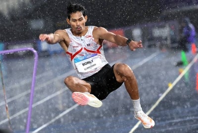 National para long jump star Datuk Abdul Latif Romly in action during the men's T20 long jump event at the Glasgow 2026 Commonwealth Games at Scotstoun Stadium today. - Photo by Bernama
