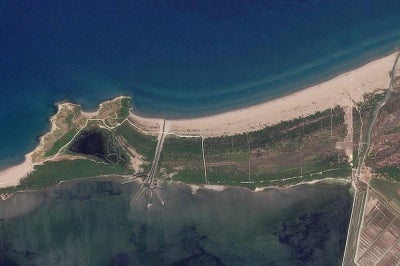 This handout satellite image taken on June 11, 2026 and released on July 21, 2026 by 2026 Planet Labs PBC shows a protected area on the coast of the Narta Lagoon, on the southwest coast of Albania near Vlora where the construction of a tourist complex linked to the Trump family is planned. - (Photo by Handout / 2026 Planet Labs PBC / AFP)
