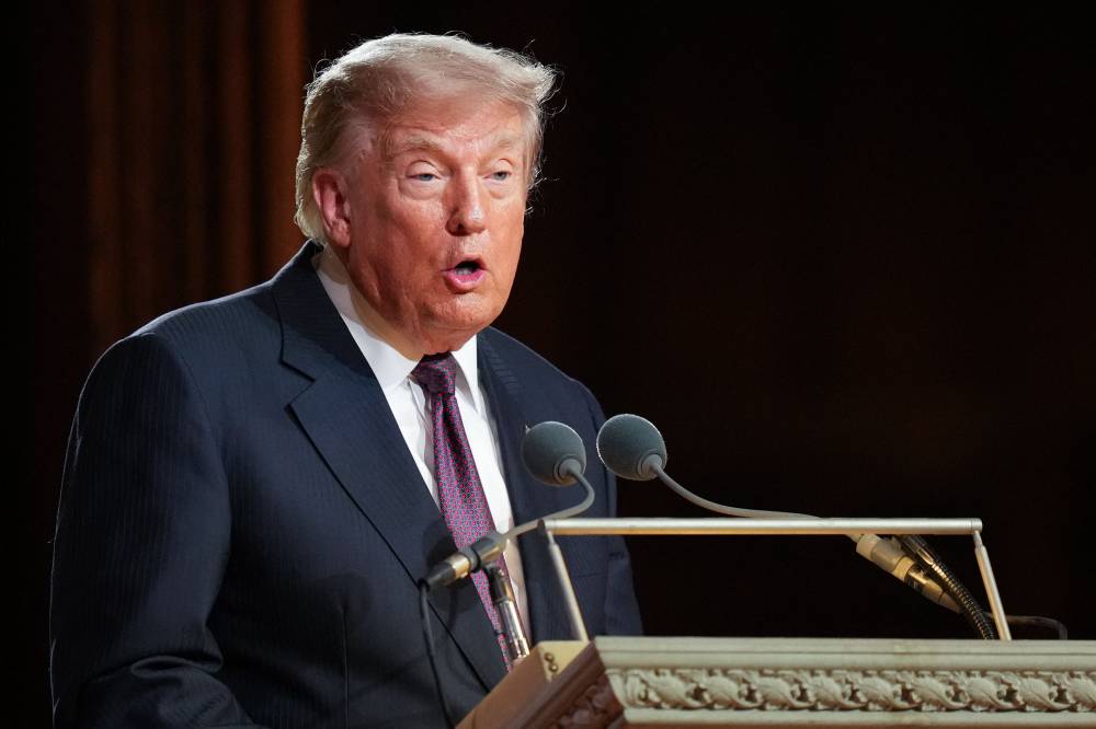 US President Donald Trump speaks during the funeral service for US Senator Lindsey Graham at the Washington National Cathedral in Washington, DC, on July 28, 2026. - (Photo by Alex Brandon / POOL / AFP)